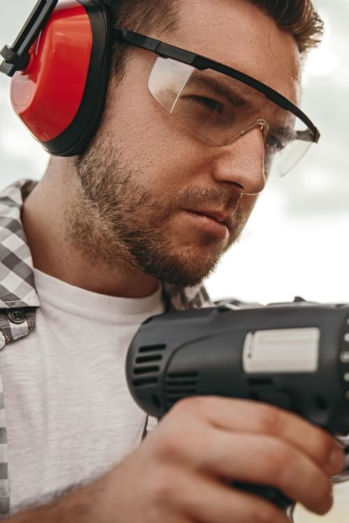 builder-working-with-drill-on-construction.jpg
